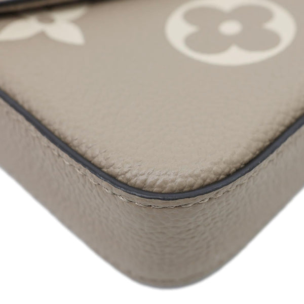 LOUIS VUITTON Felicie Pochette Giant Monogram Empreinte Crossbody Bag Bicolor