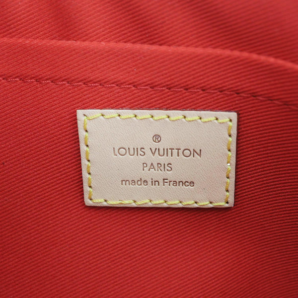 LOUIS VUITTON Neverfull Monogram Canvas Wristlet Pouch Brown