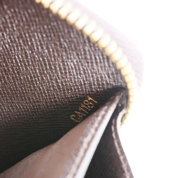 LOUIS VUITTON Monogram Mini Lin Canvas Zippy Wallet Brown