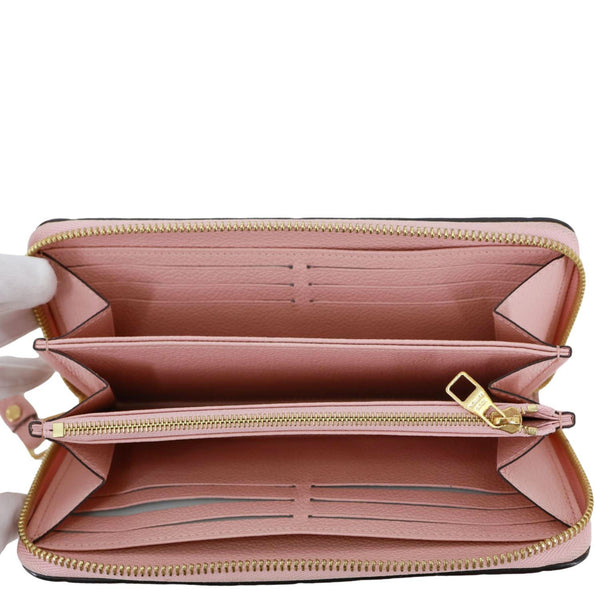 LOUIS VUITTON Monogram Empreinte Leather Zippy Wallet Rose Poudre Pink