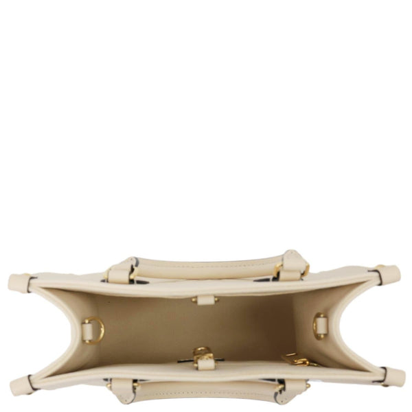 LOUIS VUITTON Onthego PM Monogram Empreinte Leather Shoulder Bag Off White