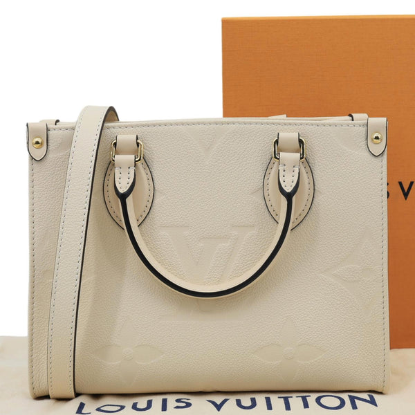 LOUIS VUITTON Onthego PM Monogram Empreinte Leather Shoulder Bag Off White