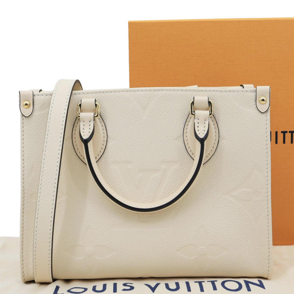 LOUIS VUITTON Onthego PM Monogram Empreinte Leather Shoulder Bag Off White