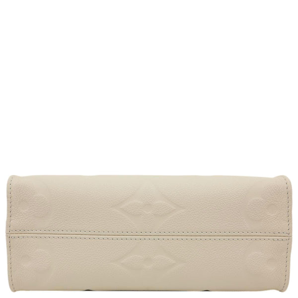 LOUIS VUITTON Onthego PM Monogram Empreinte Leather Shoulder Bag Off White