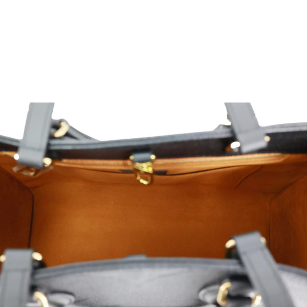 LOUIS VUITTON Onthego MM Giant Monogram Empreinte Shoulder Bag Black