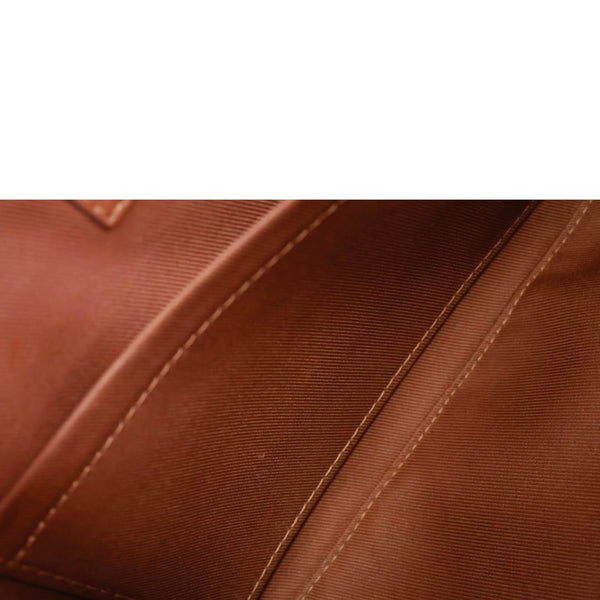 LOUIS VUITTON Saintonge Monogram Empreinte Leather Crossbody Bag Cream