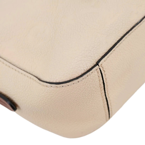 LOUIS VUITTON Saintonge Monogram Empreinte Leather Crossbody Bag Cream