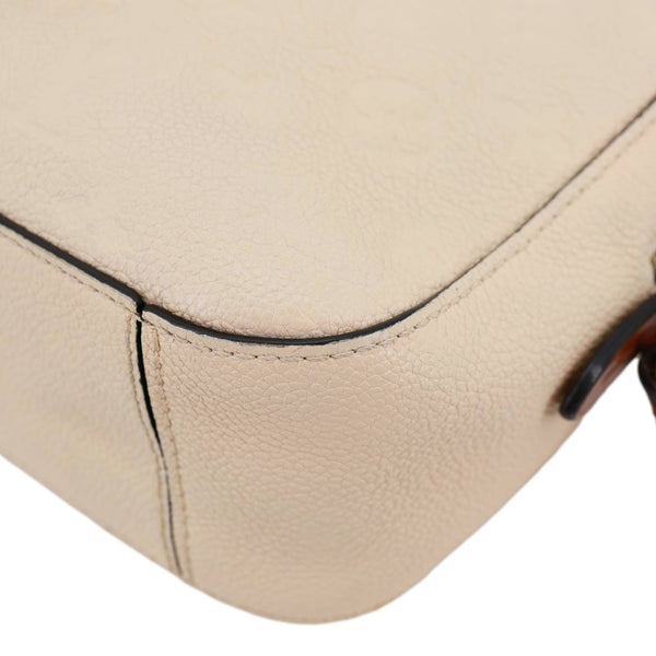 LOUIS VUITTON Saintonge Monogram Empreinte Leather Crossbody Bag Cream