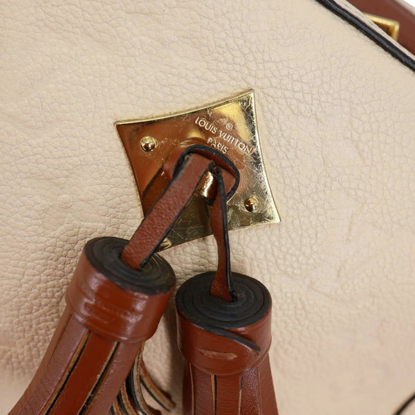 LOUIS VUITTON Saintonge Monogram Empreinte Leather Crossbody Bag Cream