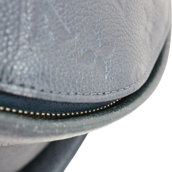 LOUIS VUITTON Flower Pins Monogram Empreinte Leather Backpack Blue