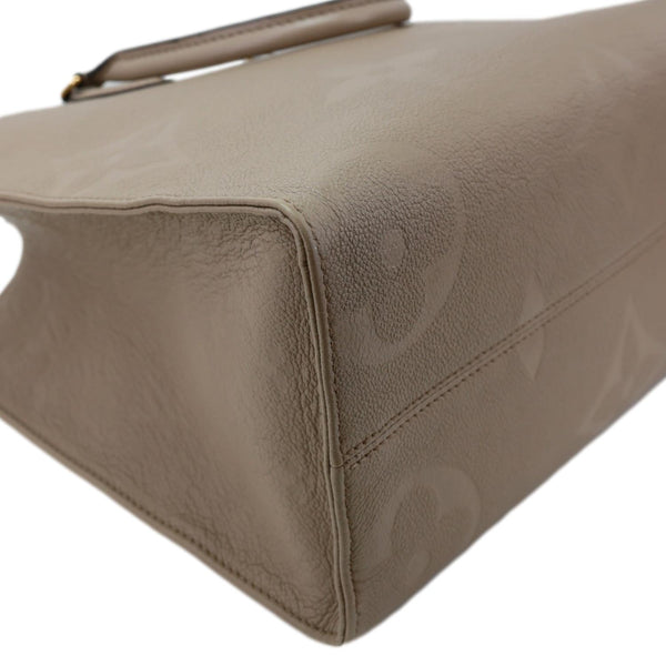 LOUIS VUITTON Onthego MM Giant Monogram Empreinte Leather Tote Bag Beige