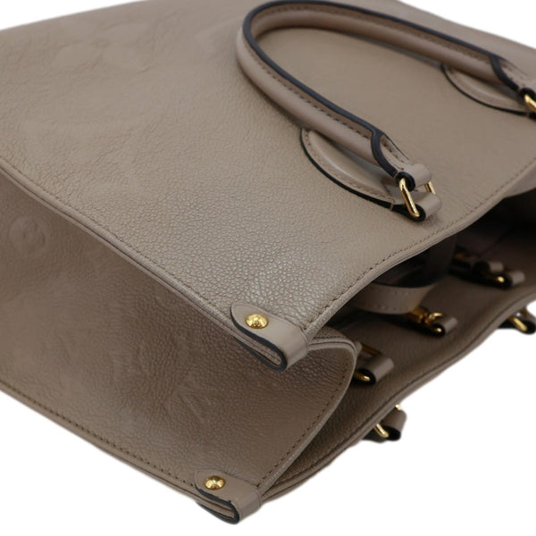 LOUIS VUITTON Onthego MM Giant Monogram Empreinte Leather Tote Bag Beige
