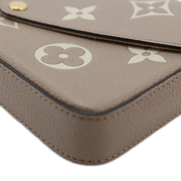 LOUIS VUITTON Felicie Pochette Giant Monogram Empreinte Crossbody Bag Bicolor