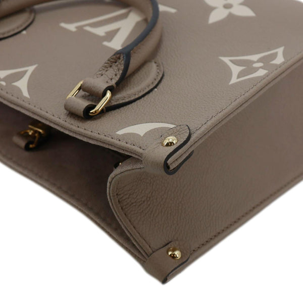 LOUIS VUITTON Onthego PM Bicolor Monogram Empreinte Crossbody Bag Cream