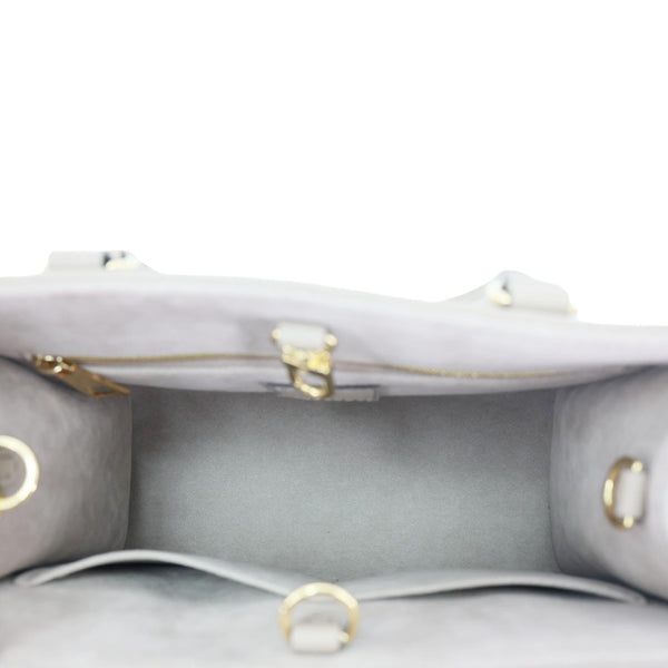 LOUIS VUITTON Onthego PM Bicolor Monogram Empreinte Crossbody Bag Cream