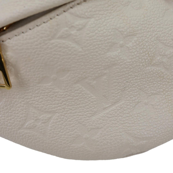 LOUIS VUITTON Monogram Empreinte Leather Bumbag Cream