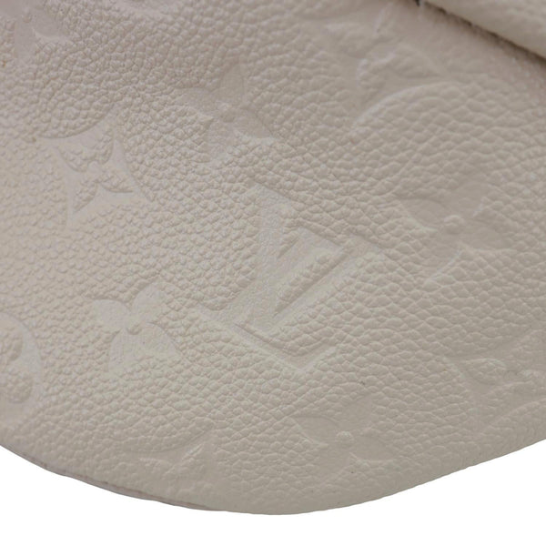 LOUIS VUITTON Monogram Empreinte Leather Bumbag Cream