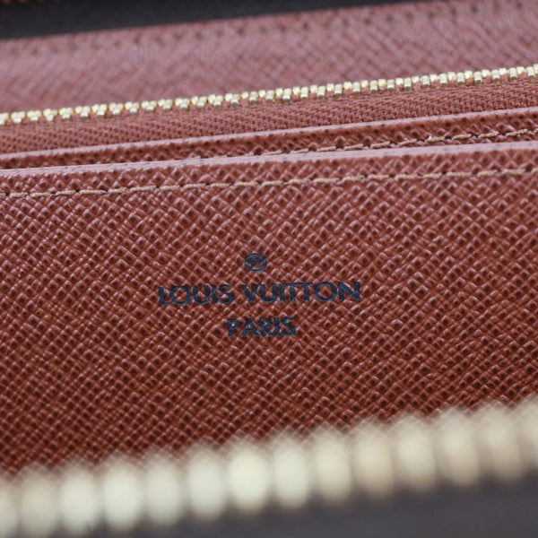 LOUIS VUITTON Monogram Canvas Zippy Wallet Brown