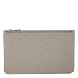 LOUIS VUITTON Neverfull Pochette Giant Monogram Empreinte Leather Wristlet Beige