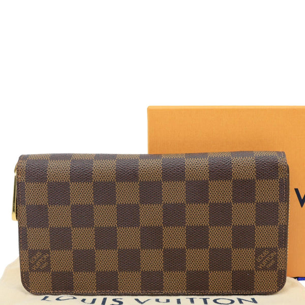 LOUIS VUITTON Damier Ebene Zippy Wallet Brown