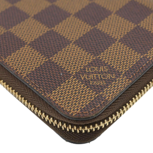 LOUIS VUITTON Damier Ebene Zippy Wallet Brown