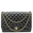 CHANEL Maxi Classic Double Flap Quilted Caviar Leather Shoulder Bag Black