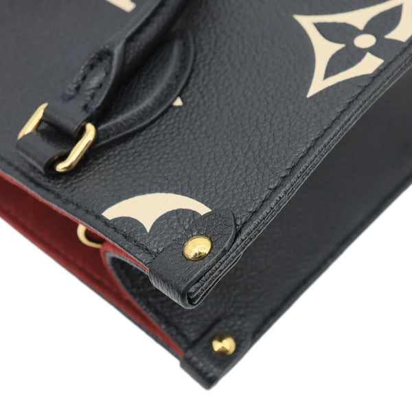 LOUIS VUITTON Onthego PM Monogram Empreinte Shoulder Bag Bicolor