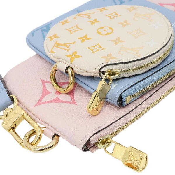 LOUIS VUITTON Trio By The Pool Giant Monogram Empreinte Leather Pouch Pink
