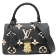 LOUIS VUITTON Madeleine BB Monogram Empreinte Leather Crossbody Bag Bicolor