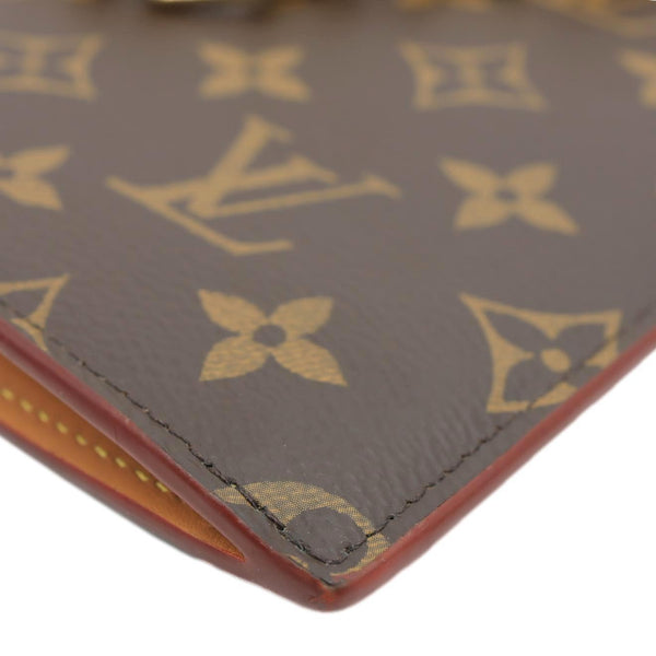 LOUIS VUITTON Legacy Monogram Canvas Chain Clutch Brown