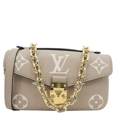 LOUIS VUITTON Metis East West Pochette Empreinte Leather Crossbody Bag Beige