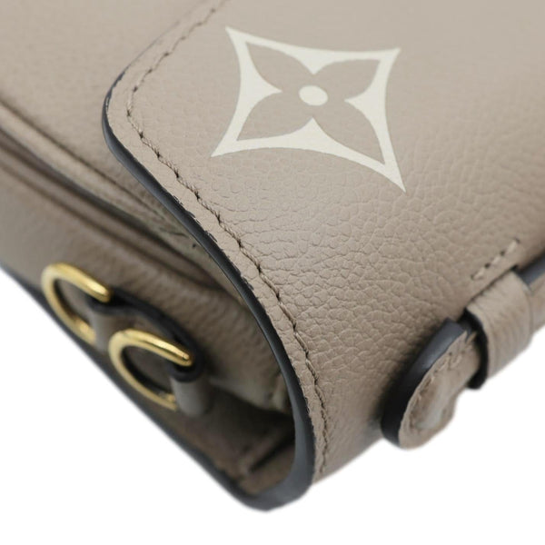 LOUIS VUITTON Metis East West Pochette Empreinte Leather Crossbody Bag Beige