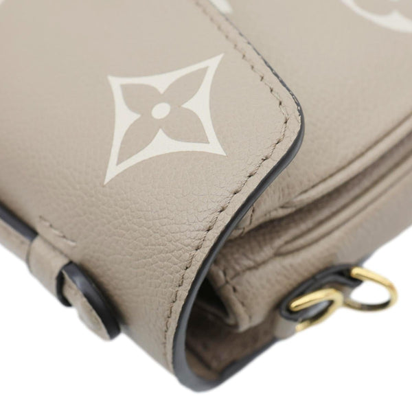 LOUIS VUITTON Metis East West Pochette Empreinte Leather Crossbody Bag Beige