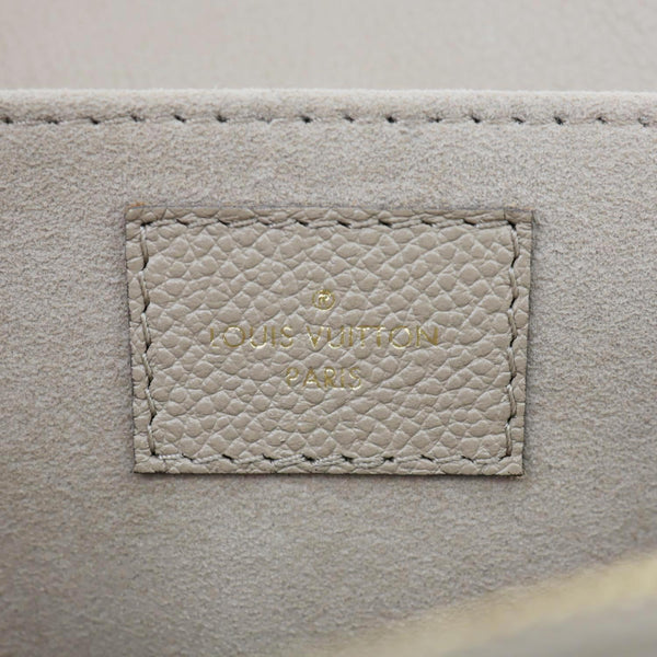 LOUIS VUITTON Metis East West Pochette Empreinte Leather Crossbody Bag Beige