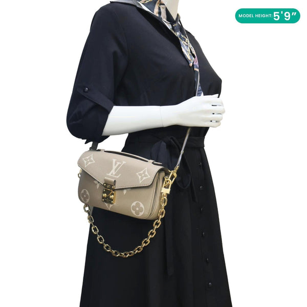 LOUIS VUITTON Metis East West Pochette Empreinte Leather Crossbody Bag Beige
