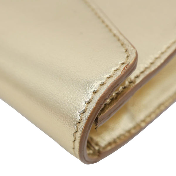 YVES SAINT LAURENT Y-Mail Metallic Calfskin Leather Clutch Gold