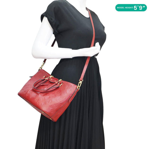 LOUIS VUITTON Mazarine Monogram Empreinte Leather Shoulder Bag Red - Model wearing