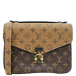 LOUIS VUITTON Metis Pochette Reverse Monogram Canvas Crossbody Bag Brown