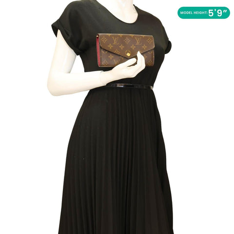 Louis Vuitton Sarah Brown & Fuchsia Monogram Canvas Wallet - Model Holding