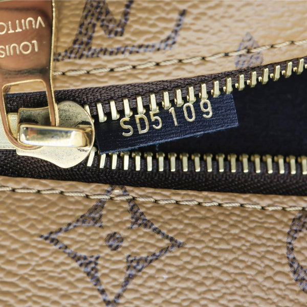 LOUIS VUITTON Metis Pochette Reverse Monogram Canvas Crossbody Bag Brown