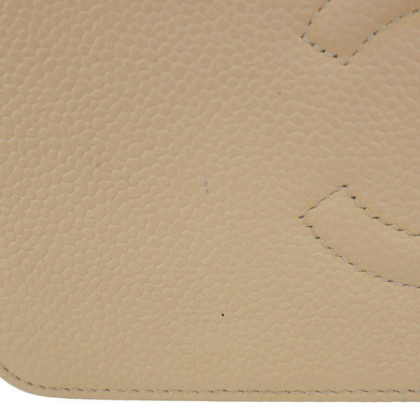 CHANEL CC Zip Around Caviar Leather Wallet Beige