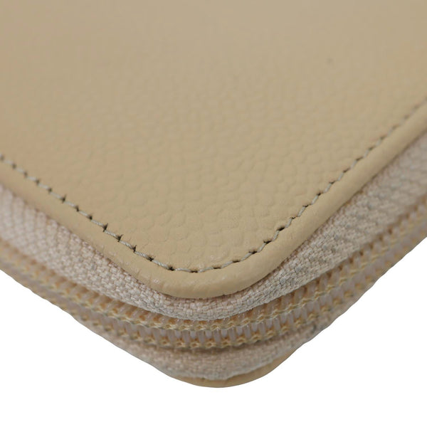 CHANEL CC Zip Around Caviar Leather Wallet Beige