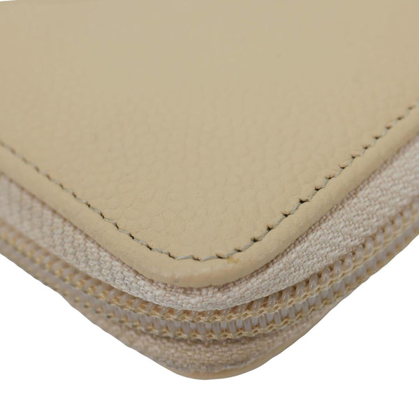 CHANEL CC Zip Around Caviar Leather Wallet Beige