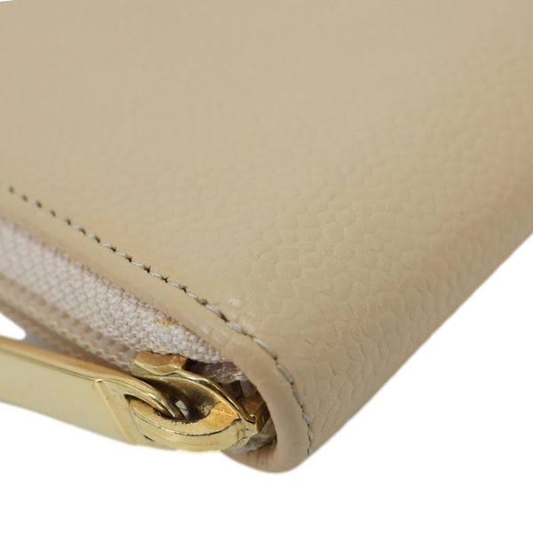 CHANEL CC Zip Around Caviar Leather Wallet Beige