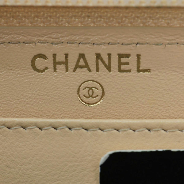 CHANEL CC Zip Around Caviar Leather Wallet Beige