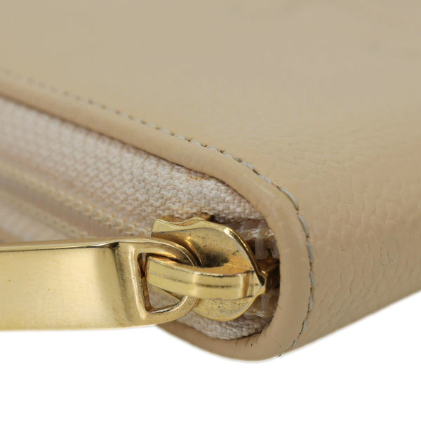 CHANEL CC Zip Around Caviar Leather Wallet Beige