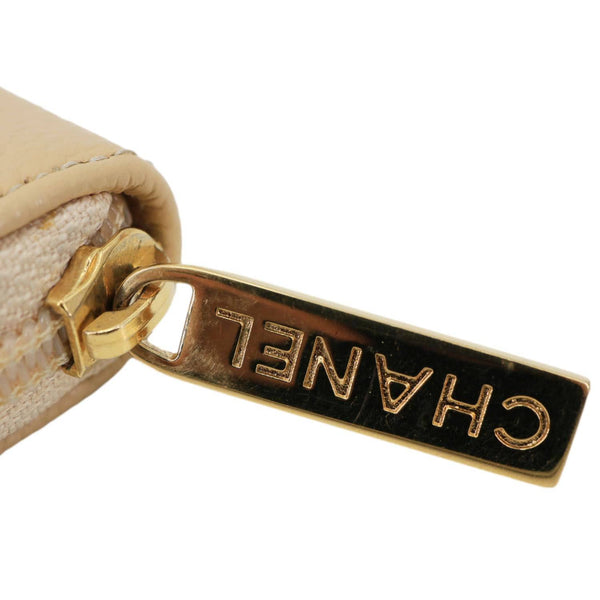 CHANEL CC Zip Around Caviar Leather Wallet Beige