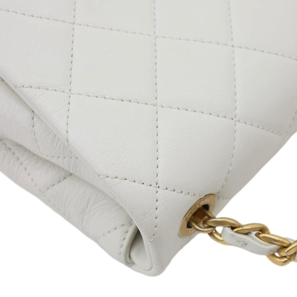 CHANEL Pearl Side Flap Quilted Leather Crossbody Bag White