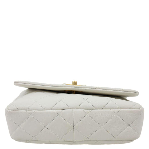 CHANEL Pearl Side Flap Quilted Leather Crossbody Bag White