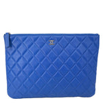 CHANEL O Case Large Quilted Lambskin Leather Clutch Blue